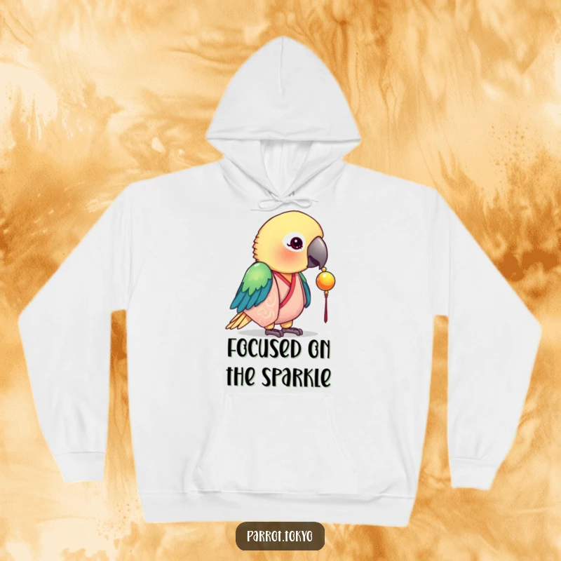 Funny hoodie featuring a curious parrot in a silk kimono, examining a shiny bead. Cozy and captivating.