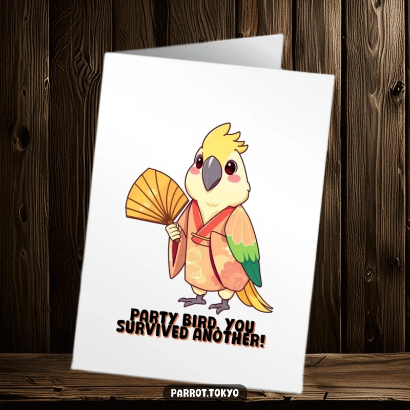 Funny Free Printable Birthday Card: A cheerful parrot in a festive kimono joyfully holds a fan, ready to celebrate.